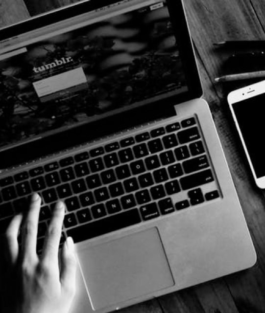 desktop image
          of someone typing on a macbook pro