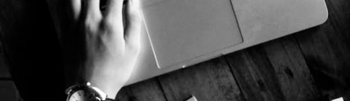 tablet image
          of someone typing on a macbook pro